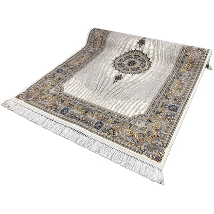 Rug Elara 160x230 side view: cream-colored surface with blue and gold medallions and fringes