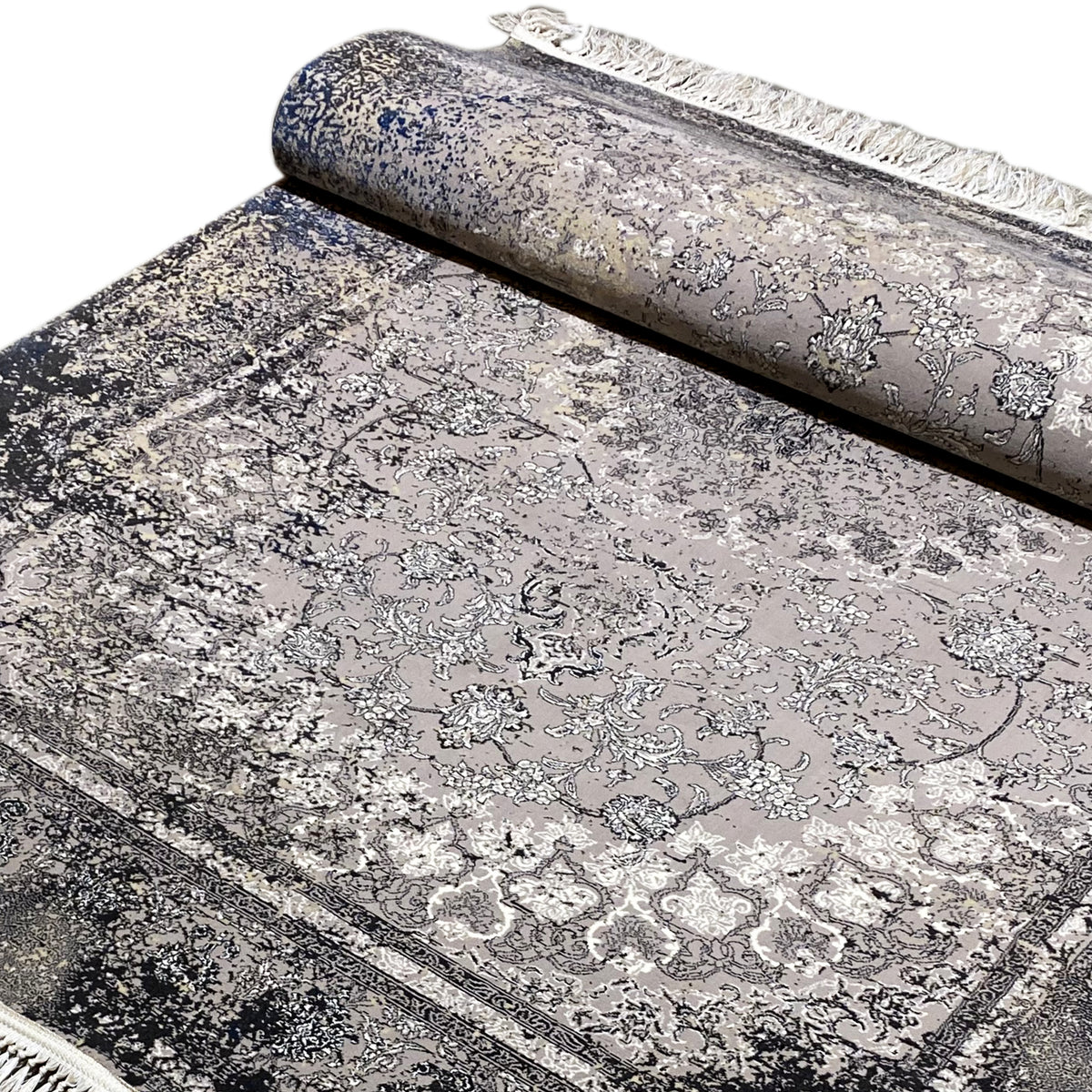 Vintage gray rug, rolled, with a delicate ornamental pattern and fringes