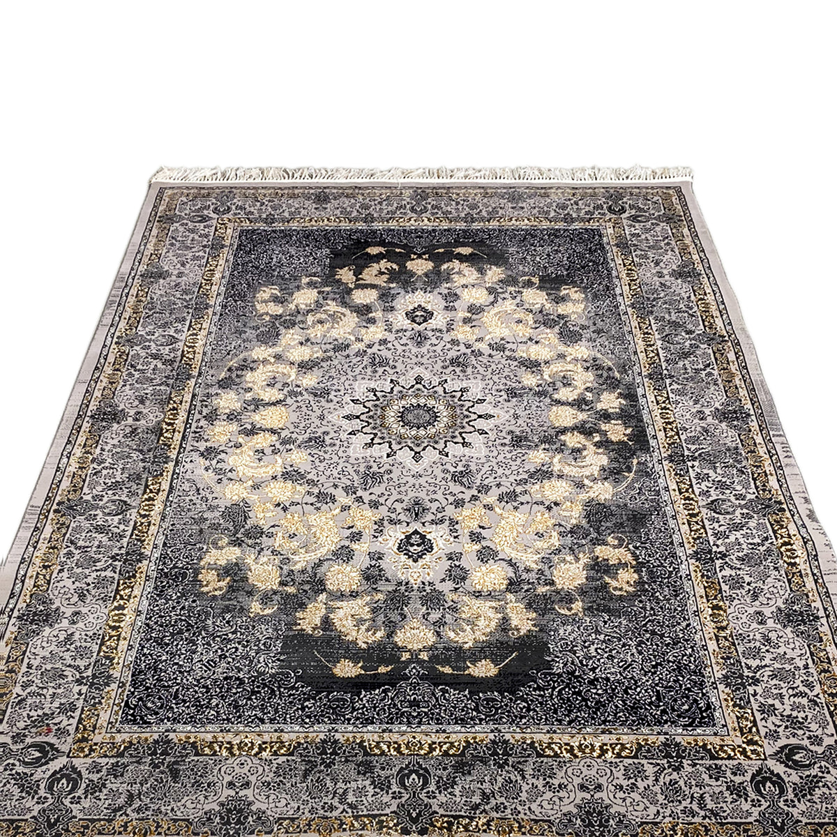 Medallion rug with a central ornamental medallion, dark blue background, beige patterns, fringes