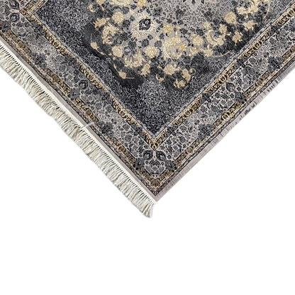 Rug corner with a border trim, dark blue background, beige patterns, and white fringes