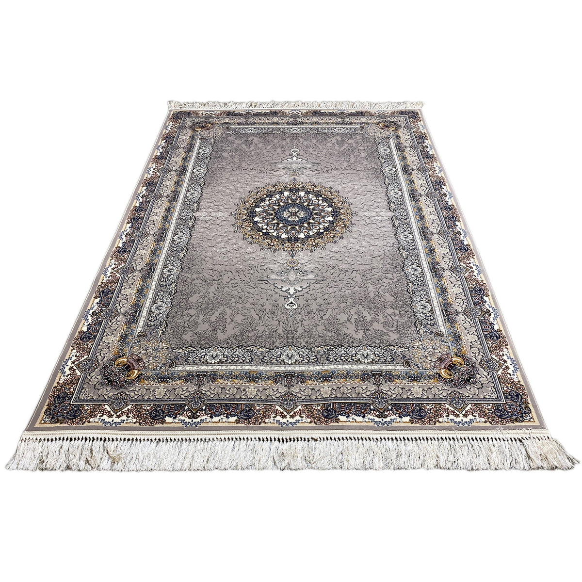 Noah anthracite rug with blue-gold medallion, border, and fringes