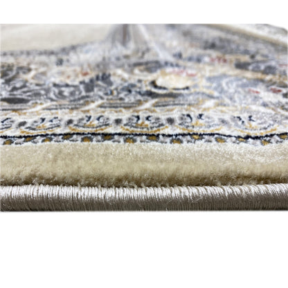 Carpet edge with fringe: blue-silver trim along the border edge