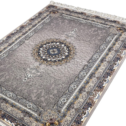 Anthracite vintage rug with a medallion pattern, rich borders, and fringes
