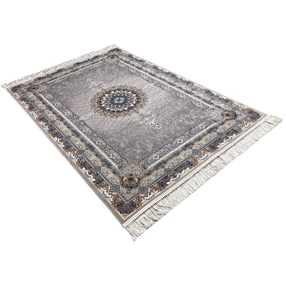 Anthracite-colored rug with a central medallion, ornamental border and fringes