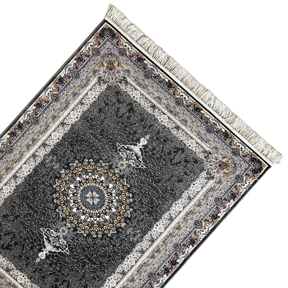 Black oriental rug with an all-around border design, fringes, and a central medallion