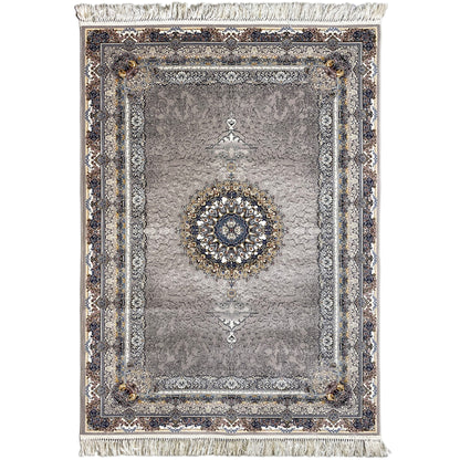 Noah rug in anthracite with an ornamental medallion, blue border, and fringes