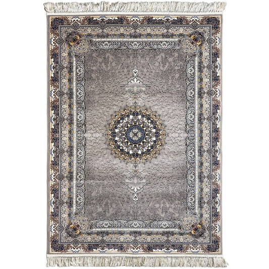 Noah rug in anthracite with an ornamental medallion, blue border, and fringes