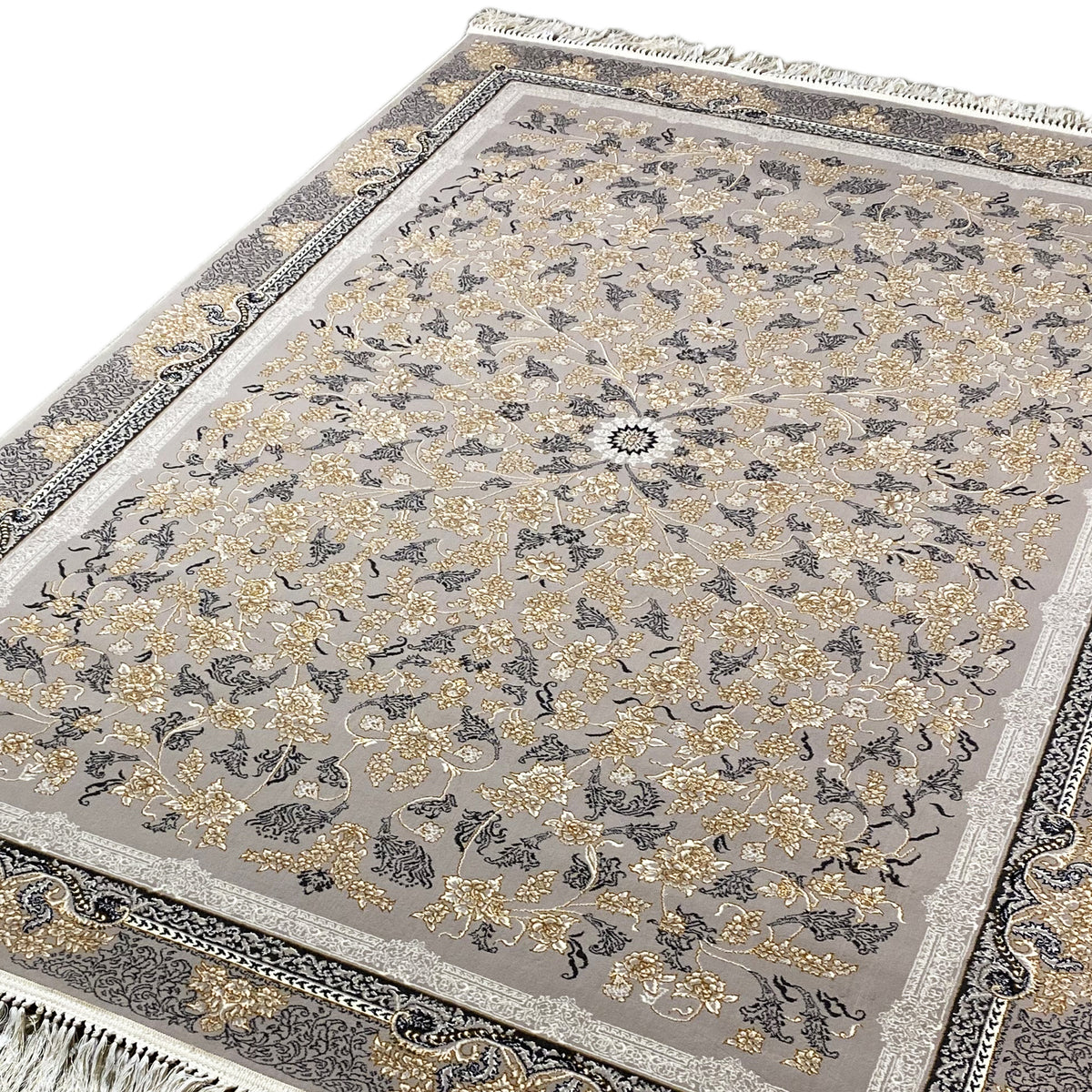 Carpet medallion with floral ornaments on a gray background, framed by a decorative border, fringes