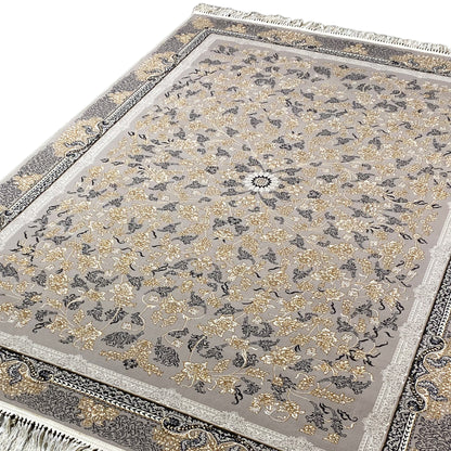 Carpet medallion with floral ornaments on a gray background, framed by a decorative border, fringes