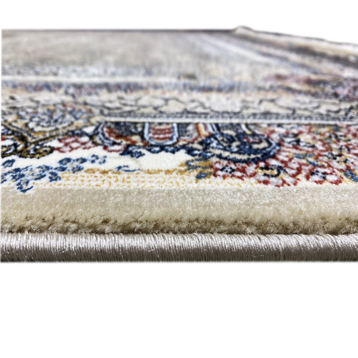 Rug edge with fringes and a multicolored border pattern