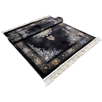 Rolled carpet: dark background with floral ornaments in gold and silver, fringes
