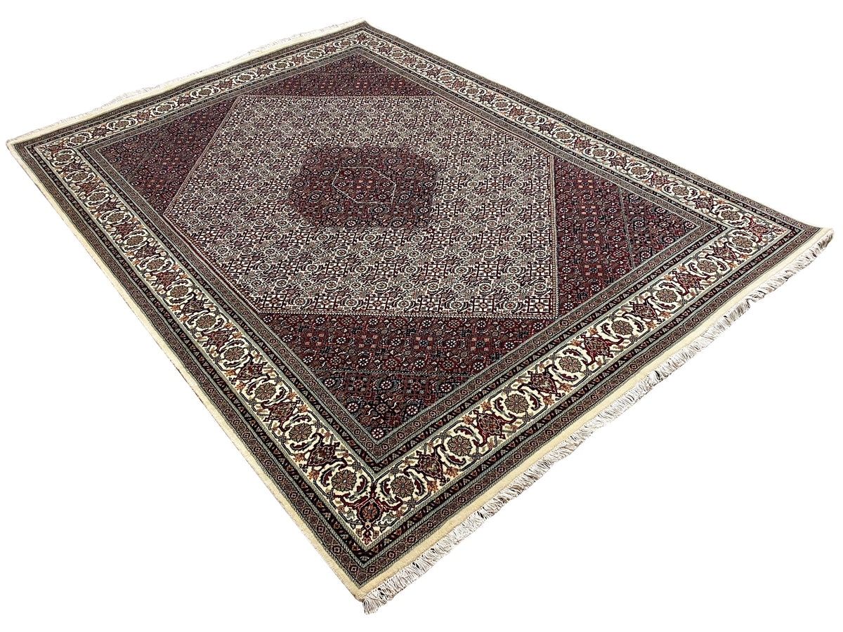 Bidjar rug: flat overall design with a central medallion, dark red and beige