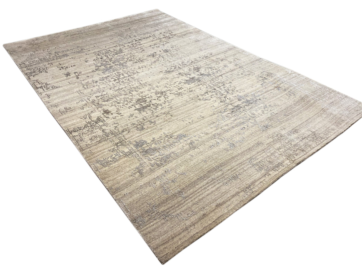 Carpet 300x205 cm photographed diagonally, beige-gray worn-effect pattern