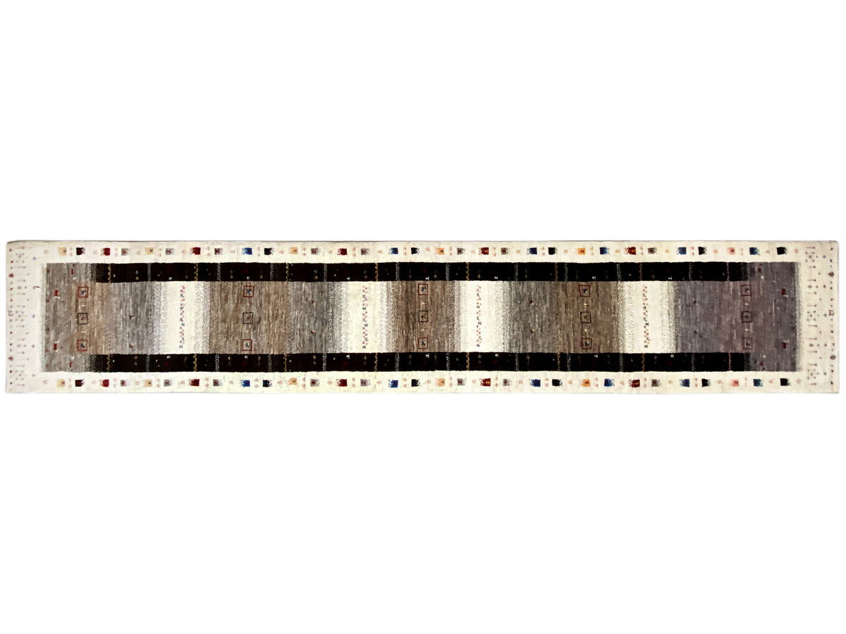 Gabbeh runner cross-section: silver-gray center with dark stripes and a dotted-pattern border