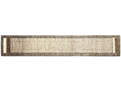 Gabbeh runner in side view with a hemmed edge and fine, even pile