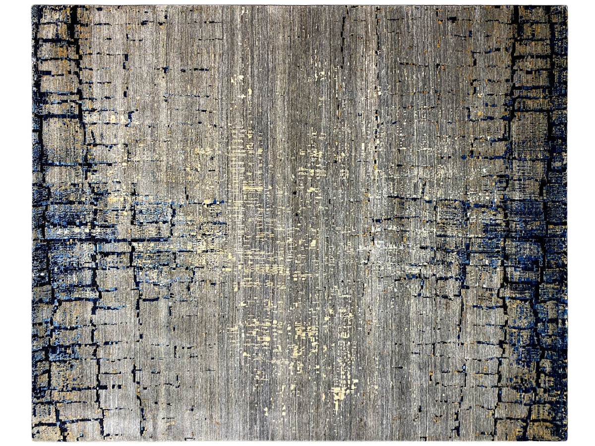 Hand-knotted rug: rectangular pattern in light gray with deep blue areas