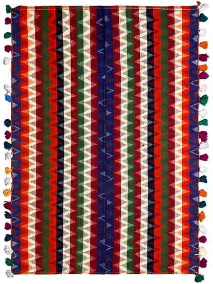 Rectangular rug with multicolored stripes and colorful tassels along all edges
