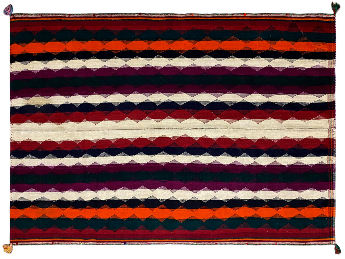 Jajim rug with horizontal stripes in red, purple, dark blue, and cream, as well as tassels