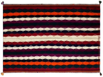 Jajim rug with horizontal stripes in red, purple, dark blue, and cream, as well as tassels