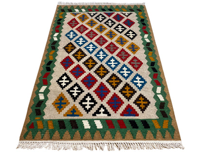 Kelim Qashqai rug, 147x95 cm, with a multicolored diamond pattern and fringes