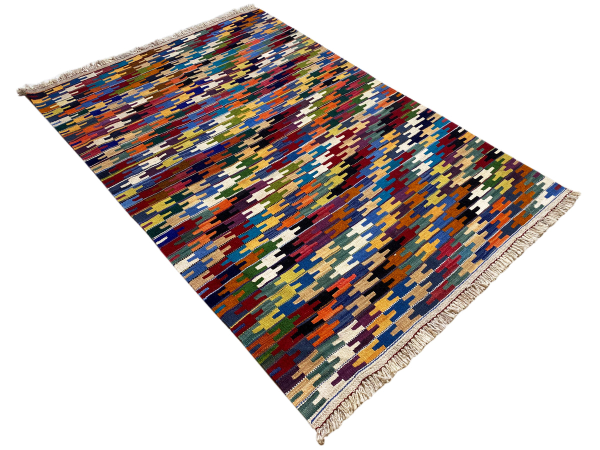 Kelim Qashqai rug, rectangular with a colorful grid pattern and fringes on two sides