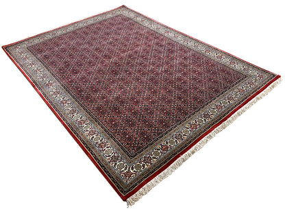 Rectangular Bidjar rug, dark red patterned with an all-around decorative border and fringes