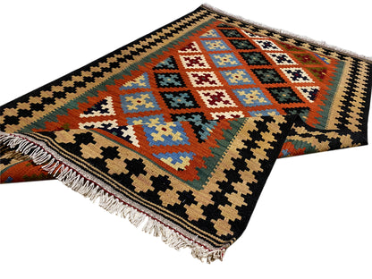 Rectangular kilim rug with geometric diamonds, multicolored, with fringes along the edge