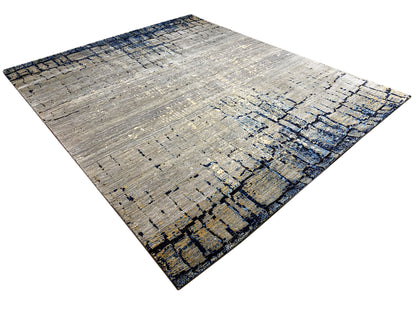 Hand-knotted rug, laid flat: light gray with a blue ornamental inlay