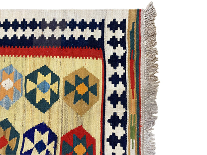 Kelim-Qashqai rug, beige at the edge: decorative stripe with fringes and multicolored accents