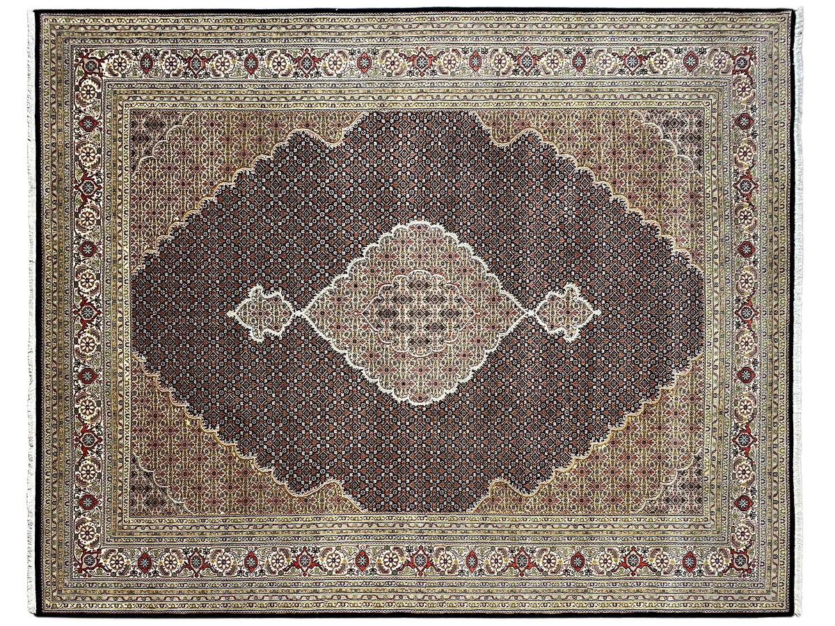 Oriental rug with a large brown medallion, beige field, and surrounding border