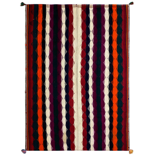 Colorful jajim rug with vertical stripes in purple, orange, dark blue, and cream