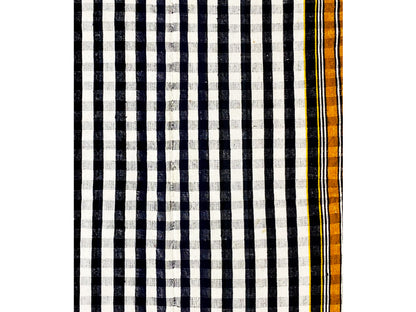 Jajim rug detail with black-and-white stripes and a narrow yellow-orange border edge