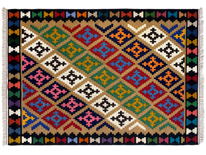 Kilim rug with a geometric grid pattern in multicolored diamonds, rectangular, with fringes.