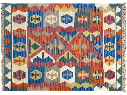 Blue Qashqai kilim rug with colorful geometric patterns, fringes