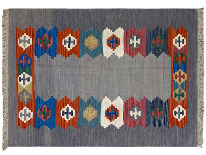 Gray mélange Kilim rug with an all-around diamond border and colorful motifs