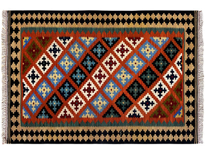 Rectangular kilim rug with a wide patterned border, diamond field in blue, red, green and white