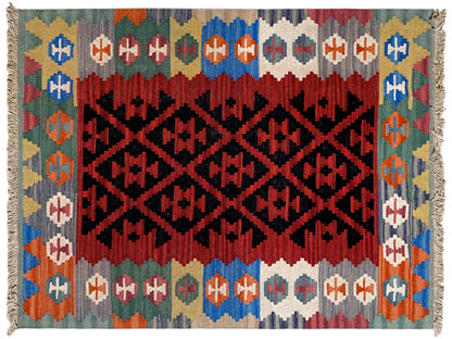 Kilim rug with a rectangular pattern in black on red, a colorful border, and fringes