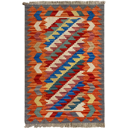 Kilim Qashqai rug, large-scale chevron pattern in orange, blue, red and white, 121x78 cm