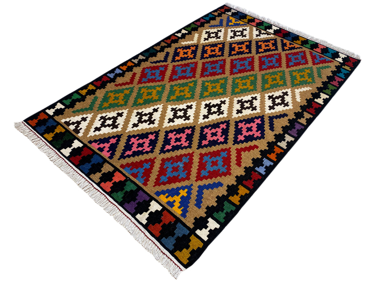 Kilim rug with a multicolored diamond and lozenge pattern, rectangular, with fringes.