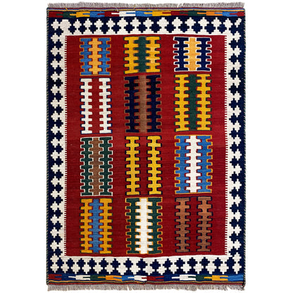 Kilim rug with a red central field, yellow and blue patterns, a blue-and-white zigzag border, and fringe