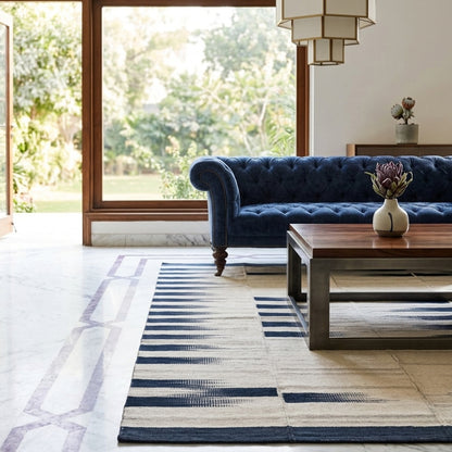 Kilim rug 170x240 cm in the living area, cream-colored pattern with dark blue stripes