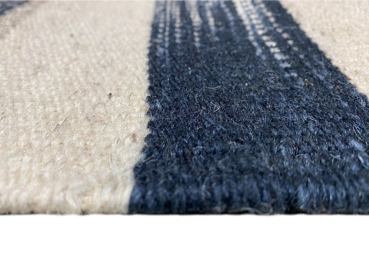 Kelim rug 170x240 cm edge detail: short-pile texture, cream and dark blue