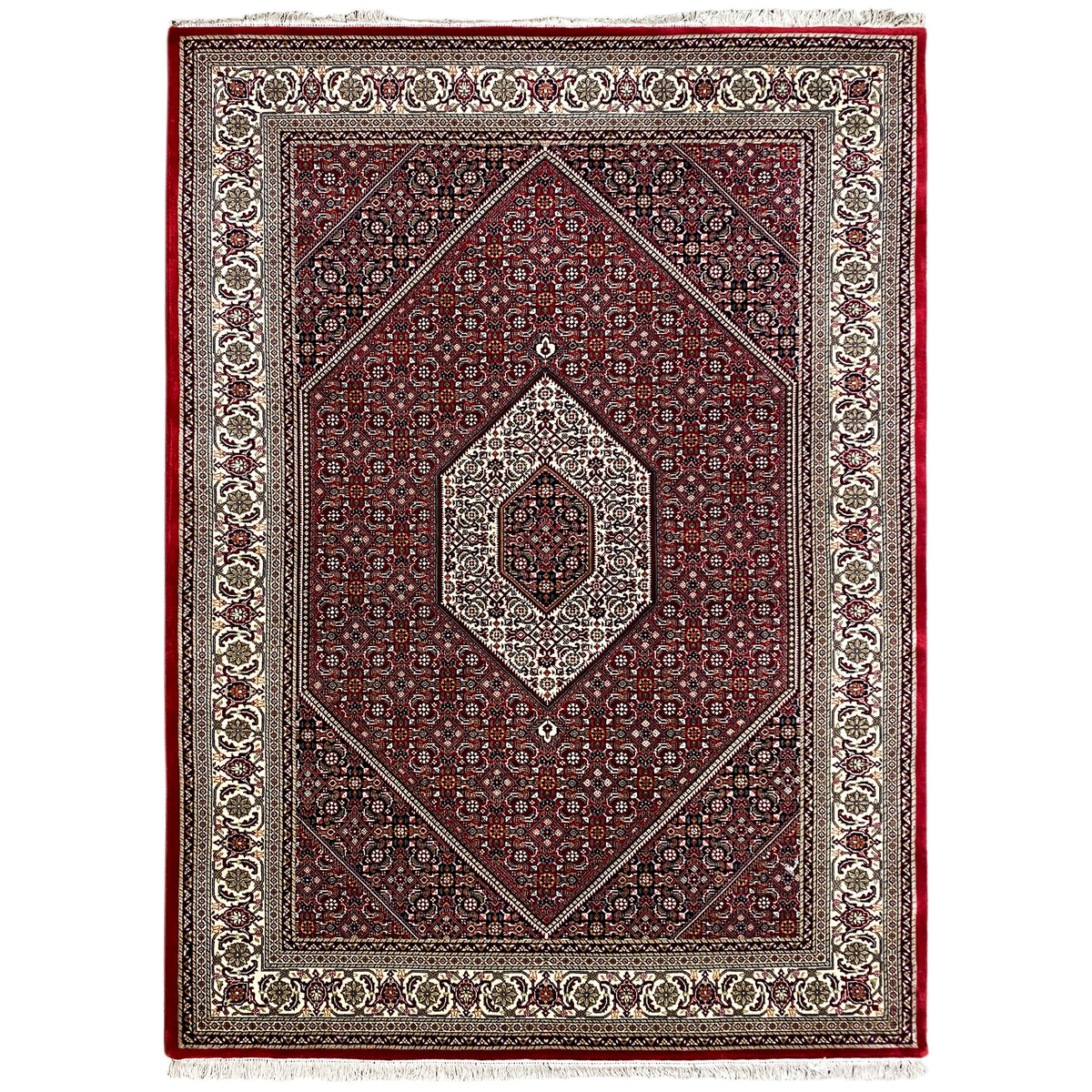 Reddish-brown carpet with a symmetrical ornamental pattern, central medallion, and border