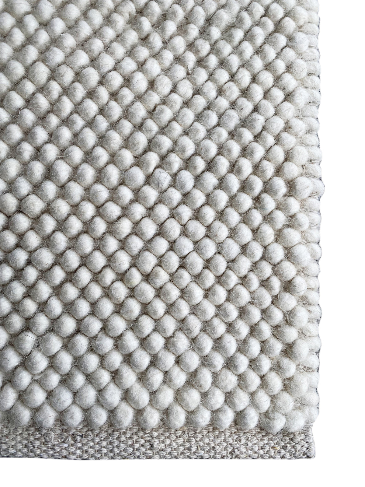 Rug, edge detail: fine wool pile with a ball texture, light gray/white