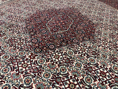 Bidjar rug: dense small-scale pattern with ornaments, predominantly dark red and cream-colored