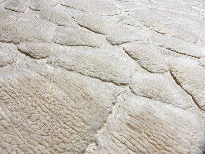 Berber rug 239x170 cm, detail view: light relief texture with lines and indentations