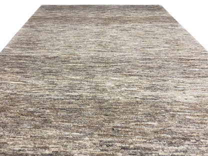 Detailed view of the fabric: Gabbeh rug with a flat gray-beige mix