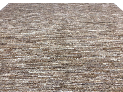 Gabbeh rug close-up: delicate interplay of lines, brown-beige low pile