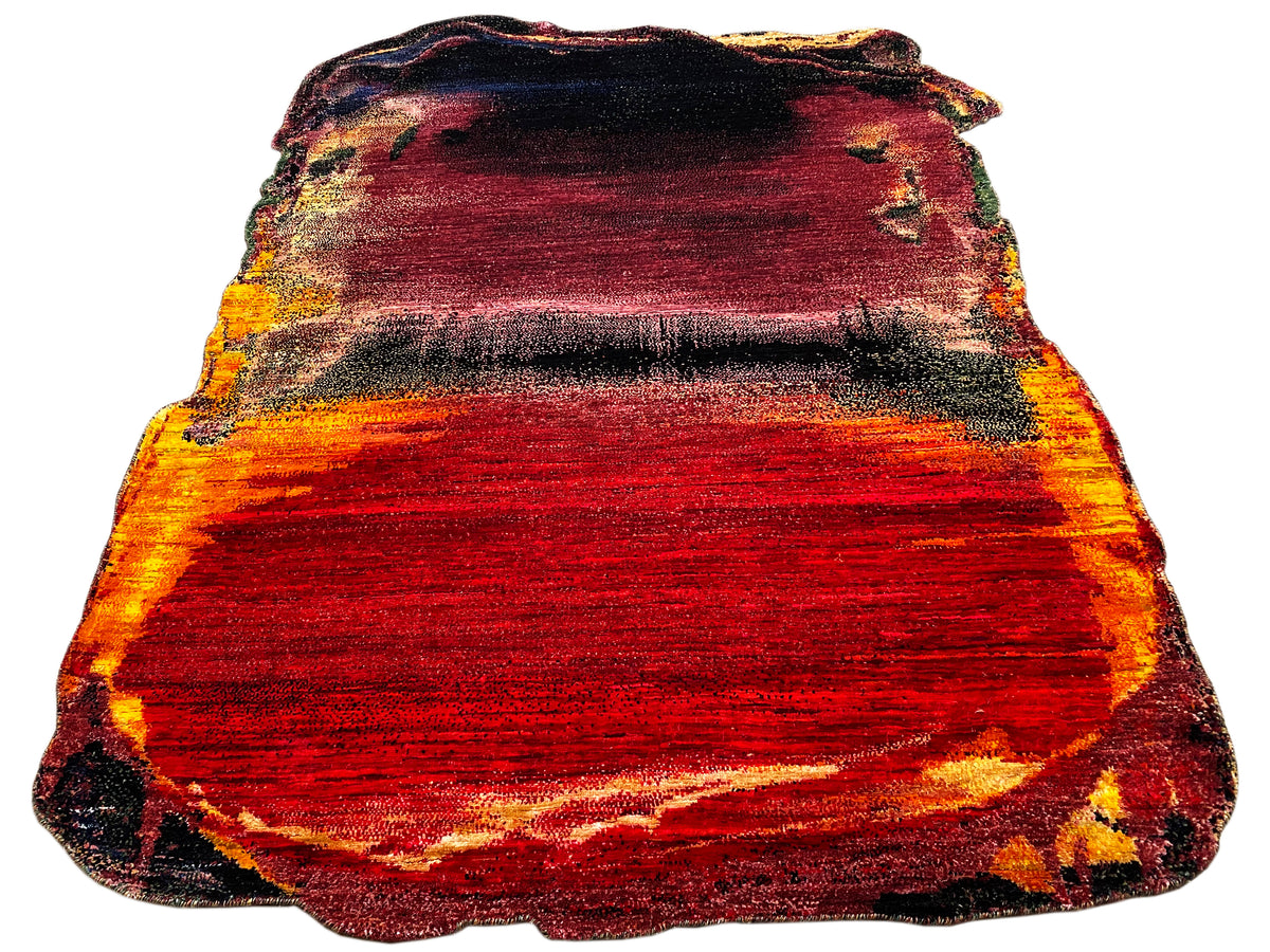 Designer rug with red-orange areas, black sections, and wavy, bordered edges