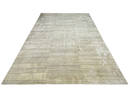 Beige designer rug in a large format with a horizontal linear texture pattern